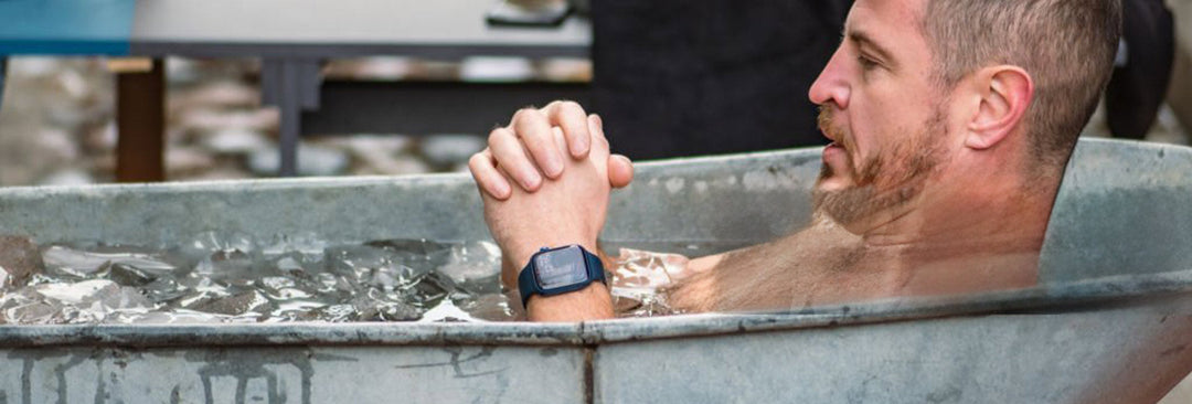 Man experiencing cold plunge ice bath therapy while questioning safety risks of cold water when sick