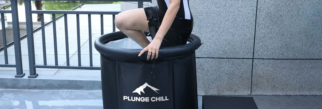 Person carefully entering Plunge Chill cold plunge tub demonstrating proper technique for safe cold water therapy immersion.