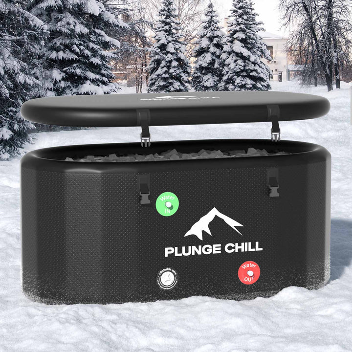 Black inflatable PLUNGE CHILL PRO cold therapy tub and lid, with clear Water IN/OUT labels for easy use.