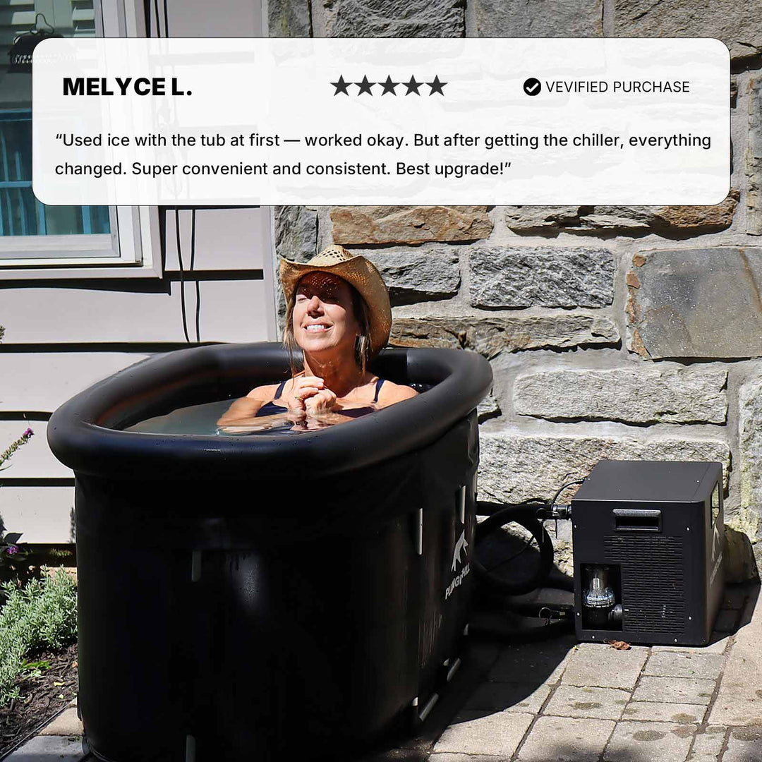 Woman using Plunge Chill tub and chiller outdoors. “Best upgrade! Super convenient and consistent,” says verified buyer Melyce L.