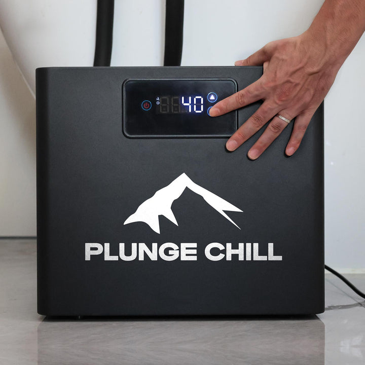 Hand adjusts Plunge Chill cold plunge chiller 40℉ LED display. Demonstrates user interface & sleek compact design.
