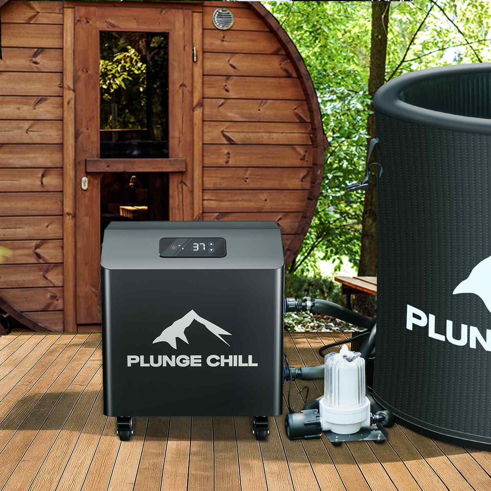 Ice bath water chiller connected to an outdoor tub, alongside a sauna for cold therapy sessions.